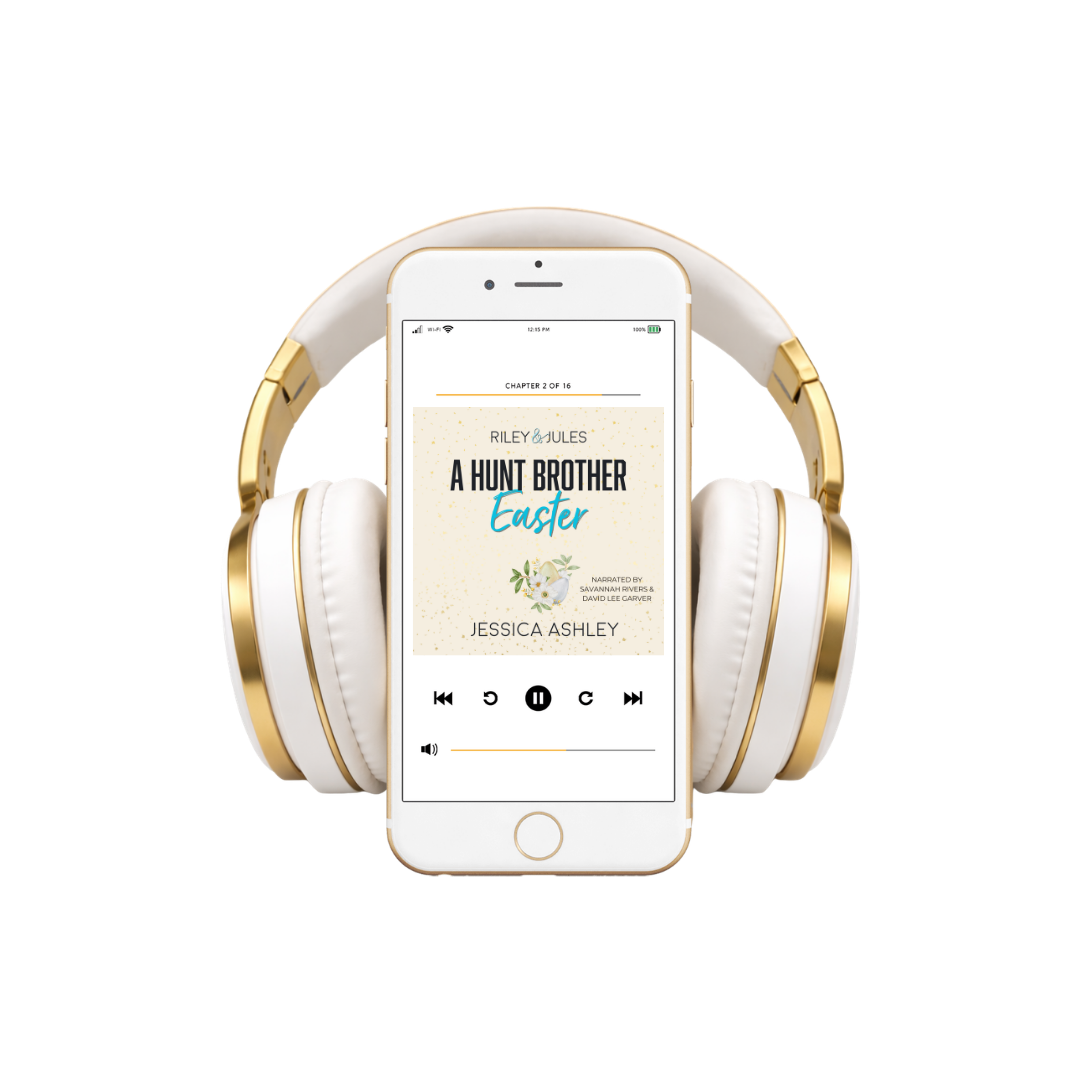 White and gold headphones with a smartphone displaying an audiobook on a white background