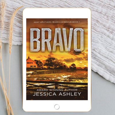 Digital book cover of 'Bravo' by Jessica Ashley on a tablet with a sunset and house background.