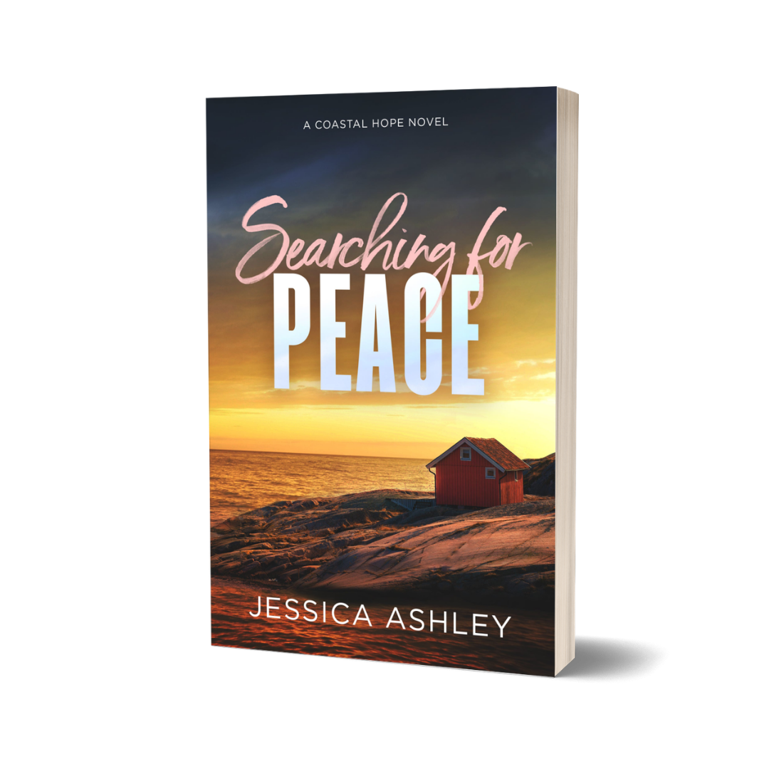 Book cover of 'Searching for Peace' by Jessica Ashley with a sunset over water and house scene.