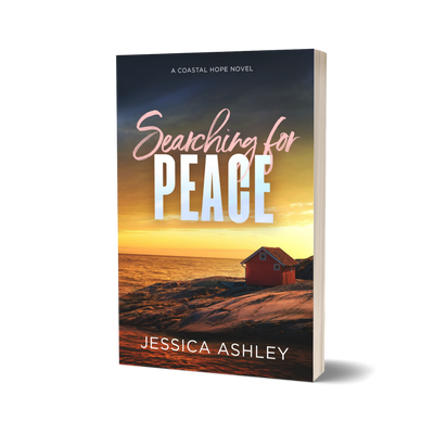 Book cover of 'Searching for Peace' by Jessica Ashley with a sunset over water and house scene.